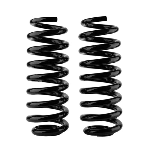 Black OME coil spring for rear Jeep WK2 on white background