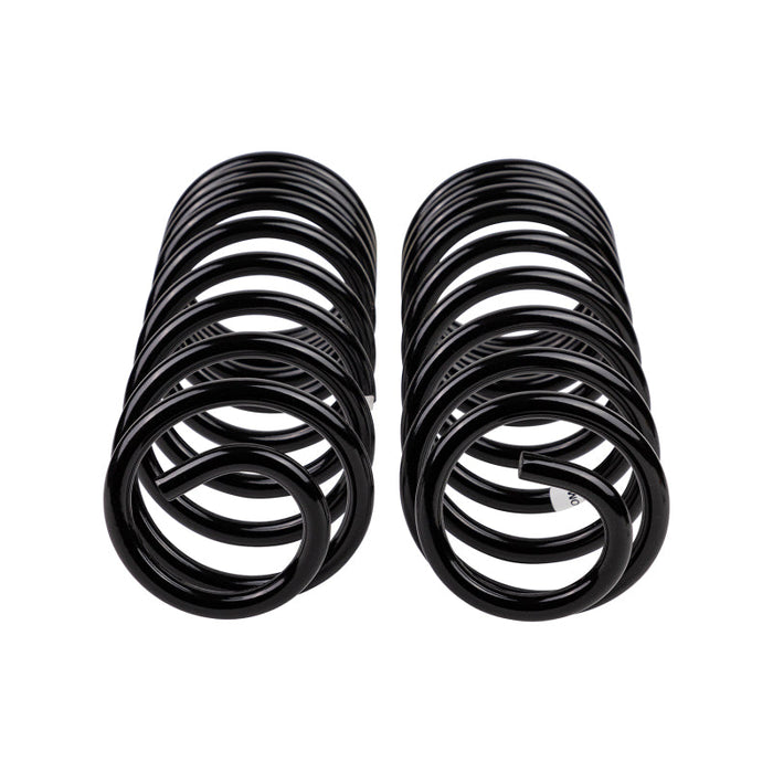 Pair of black arb / ome coil springs on white background