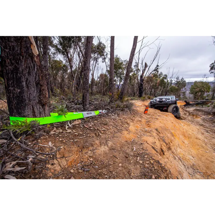 ARB Premium Recovery Kit S2 featuring truck driving on dirt road