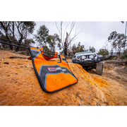 ARB Premium Recovery Kit S2 featuring a snow blower on a dirt road