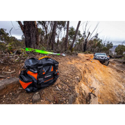ARB Premium Recovery Kit S2 with motorcycle parked on dirt road.