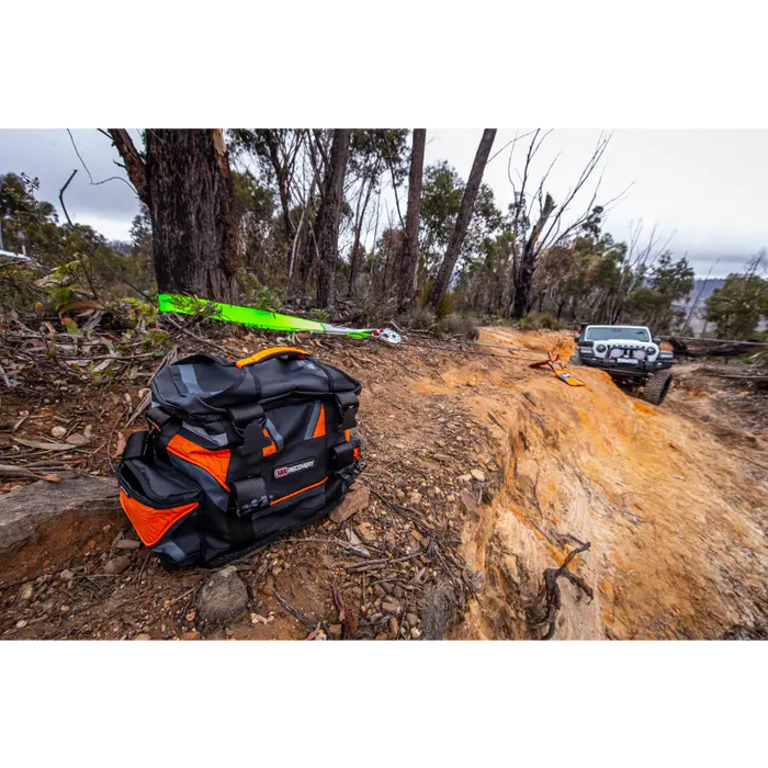 ARB Premium Recovery Kit S2 with motorcycle parked on dirt road.