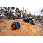 ARB Premium Recovery Kit S2 featuring man using chainsaw to remove tree.