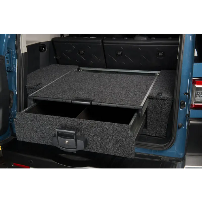 Blue van trunk compartment with ARB R/Drawer roller floor 33x31x13 intrnl.
