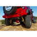 Red Jeep with Summit rear bumper parked on rocky hill