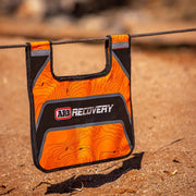 ARB Recovery Damper product with bag hanging on clothes line