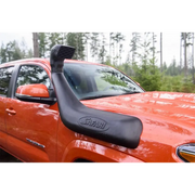 ARB Safari 4x4 snorkel with black side mirror on car
