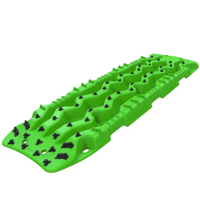 Green ARB Tred Pro recovery board with black spikes.