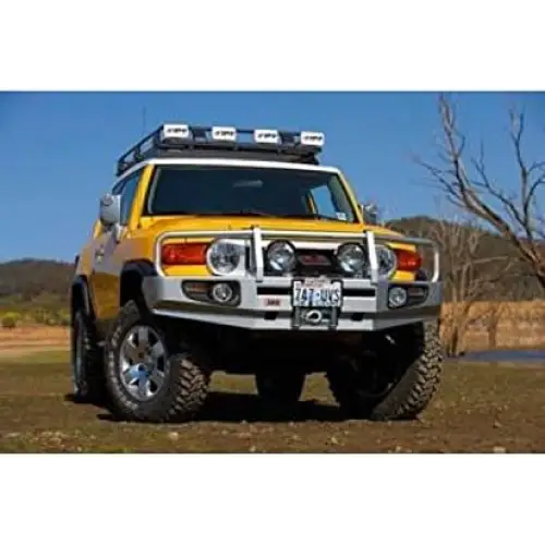 Yellow truck with white roof rack on ARB Under Panel Kit Fj Cruiser 10On Us Spec.