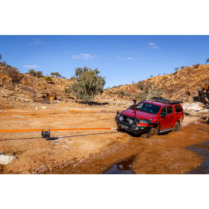 ARB Weekender Recovery Kit red truck stuck in mud