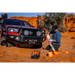 Man working on vehicle in desert - ARB Weekender Recovery Kit