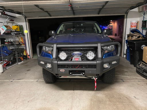 Blue truck parked in garage featuring arb winch install kit summit