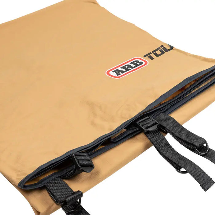 Small tan bag with zipper closure from ARB Wind Break-Side Fire Retardant USA/Canada Spec.