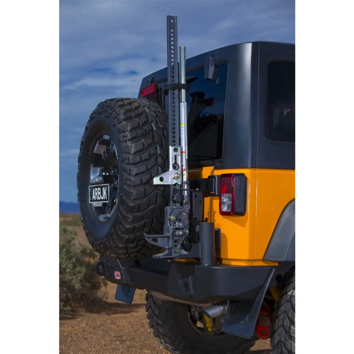 Yellow Jeep Wrangler with Black Tire Rack - ARB W/T/Carrier Suit 5650360/370 Jk