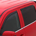 Red truck with black side window featuring avs toyota hilux double cab ventvisor in-channel front & rear window deflectors - smoke