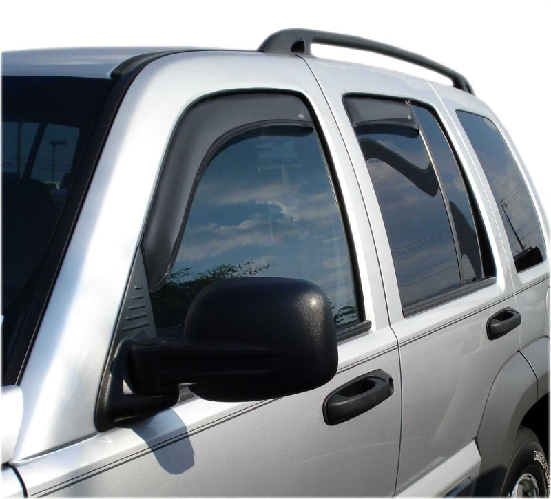 White car with black roof rack featuring avs jeep liberty ventvisor in-channel front & rear window deflectors, allowing fresh air flow