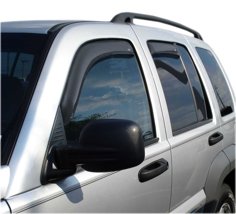 White car with black roof rack featuring avs window deflectors for fresh air circulation