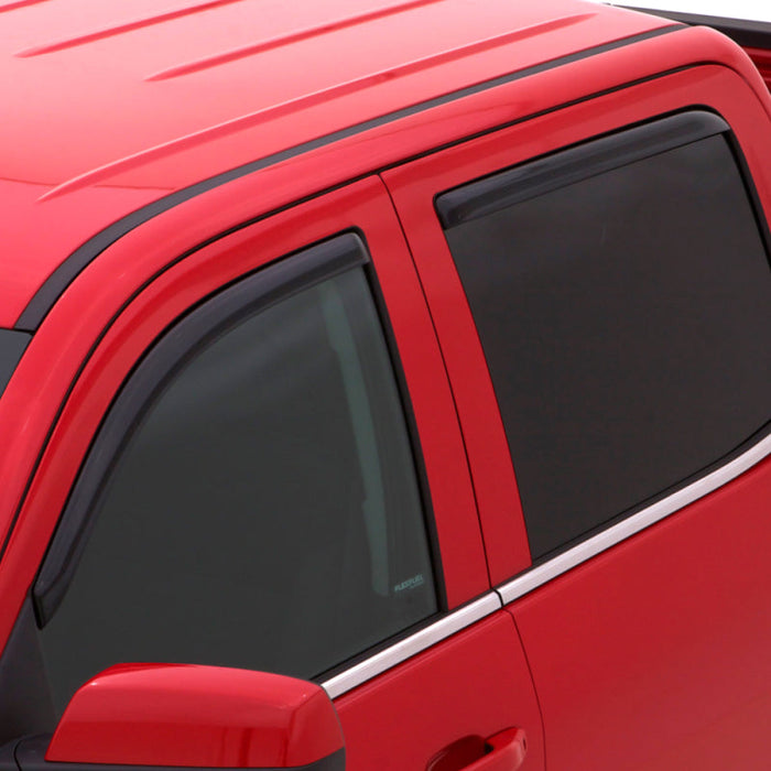 Red truck with black side window featuring avs toyota 4runner ventvisor in-channel front and rear window deflectors for fresh air