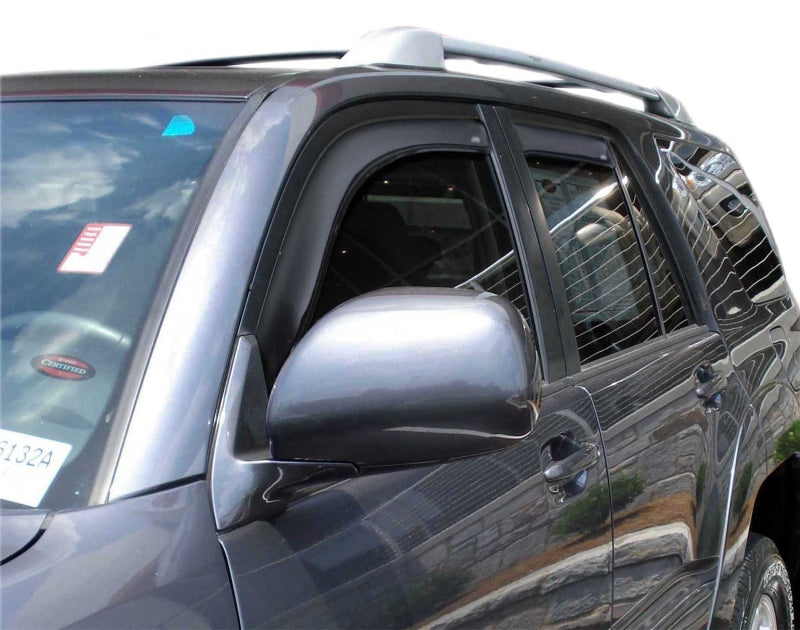 Avs 4pc smoke window deflectors for toyota 4runner - broken window with sticker on car
