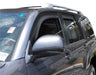 Avs 4pc smoke window deflectors for toyota 4runner - broken window with sticker on car