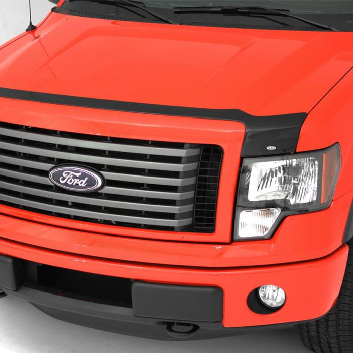 Red truck with avs aeroskin low profile acrylic hood shield displayed - smoke