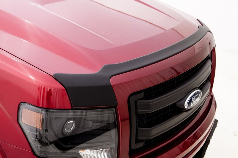 Red truck with black hood shield by avs - special hardware required