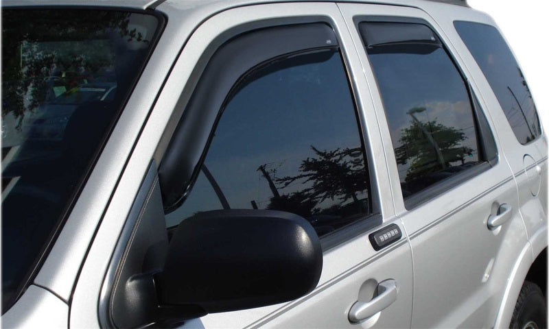 White car with black side window featuring avs toyota tacoma double cab ventvisor in-channel front & rear window deflectors for fresh air flow