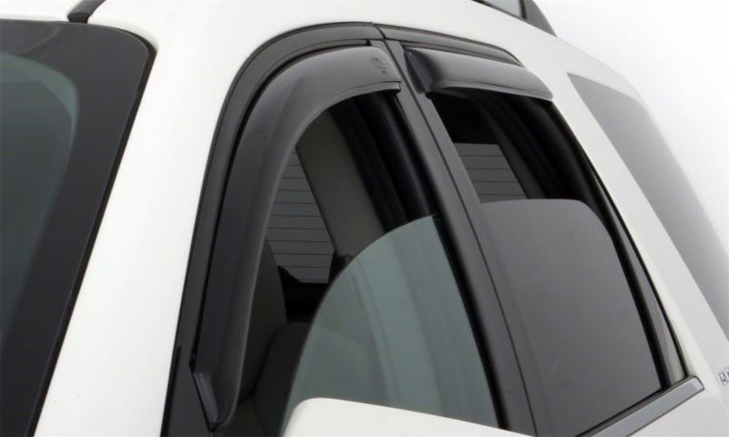 White car with black roof rack featuring avs toyota tacoma double cab ventvisor in-channel front & rear window deflectors for fresh air flow