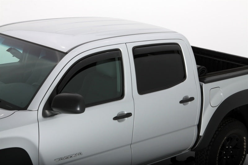 White truck with black hood and avs window deflectors, in-channel ventvisor for fresh air