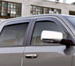 Gray car parked in front of building with avs 05-15 toyota tacoma double cab ventvisor low profile deflectors - smoke