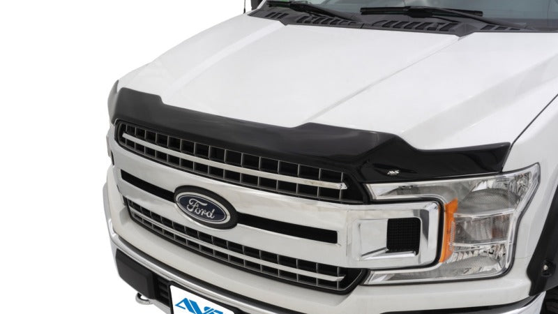 Avs aeroskin low profile acrylic hood shield on white truck with black hood