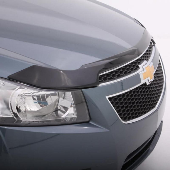 Gray chevrolet cruz with avs aeroskin low profile hood shield in smoke