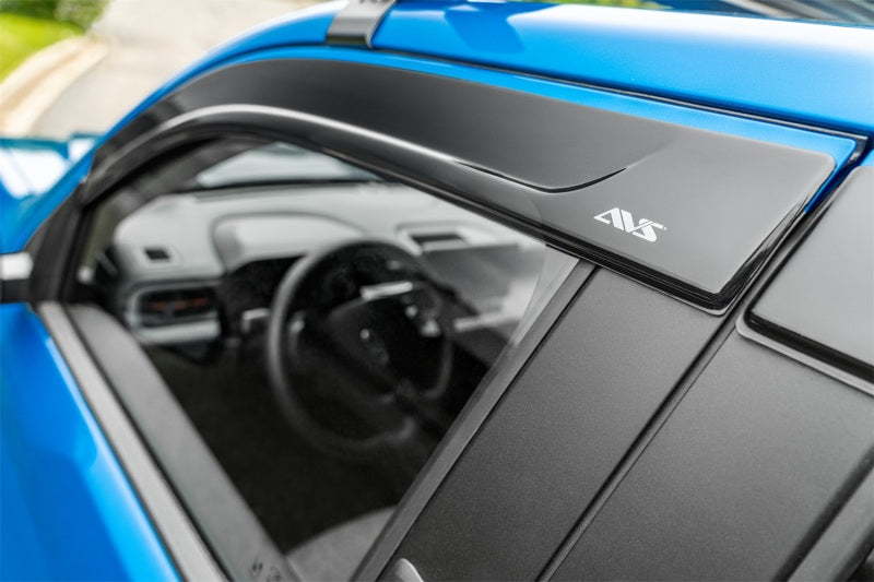 Avs low profile window deflector with door handle on blue lamb lambo car