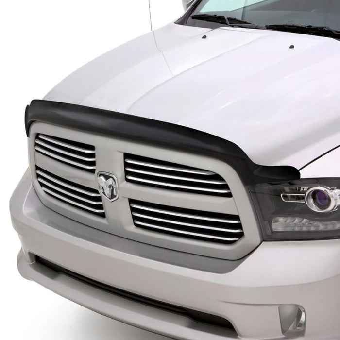 White dodge ram front end protected by avs bugflector ii hood shield - smoke, car wash safe