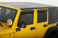 Yellow jeep with black top featuring avs original ventvisor window deflectors for jeep wrangler unlimited