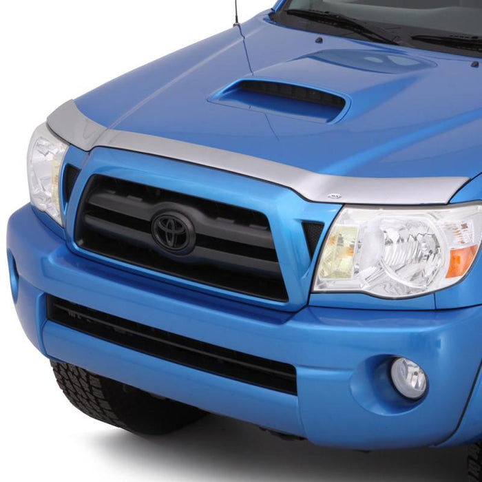Blue toyota tacoma truck with avs aeroskin low profile hood shield - chrome