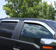 Black jeep grand cherokee with ventvisor outside mount front & rear window deflectors displayed in parking lot