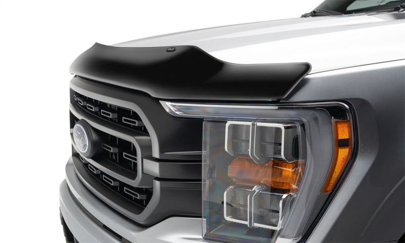 Front end view of white 2019 ford f-150 with avs bugflector hood shield - car wash safe