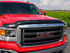 Red truck parked in a lot - avs bugflector ii hood shield - smoke