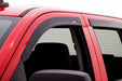 Red truck with black roof rack equipped with avs toyota tacoma window deflectors for fresh air