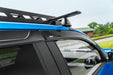 Toyota tacoma with low profile matte black window deflectors - avs 4pc