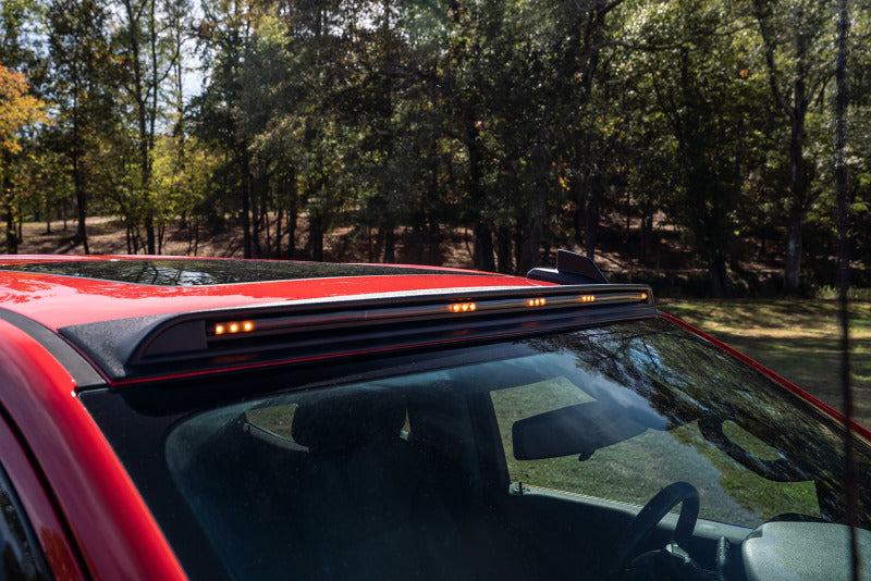 Red car with roof rack, avs marker lights for toyota tacoma