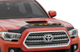 Front end view of red toyota tacoma with hood protector and led marker lights