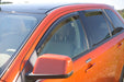 Red-painted car with avs 2019 jeep compass ventvisor in-channel window 4pc - smoke
