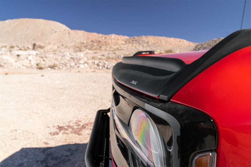 Red motorcycle parked in desert - avs ford bronco hood shield - black