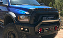 Black avs aeroskin lightshield hood protector on blue truck parked on dirt road