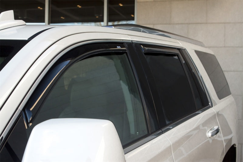 Avs jeep grand cherokee l ventvisor front & rear window deflectors - man in suit next to car