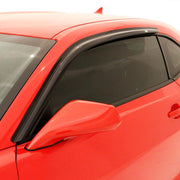 Red car with avs original ventvisor window deflectors on white background