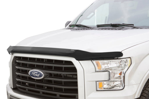 White truck with black hood featuring avs bugflector medium profile hood shield - car wash safe