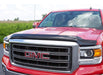 Red truck parked in lot with avs bugflector hood shield - smoke, car wash safe